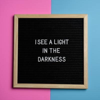 https://www.pexels.com/photo/i-see-a-light-in-the-darkness-text-2856028/